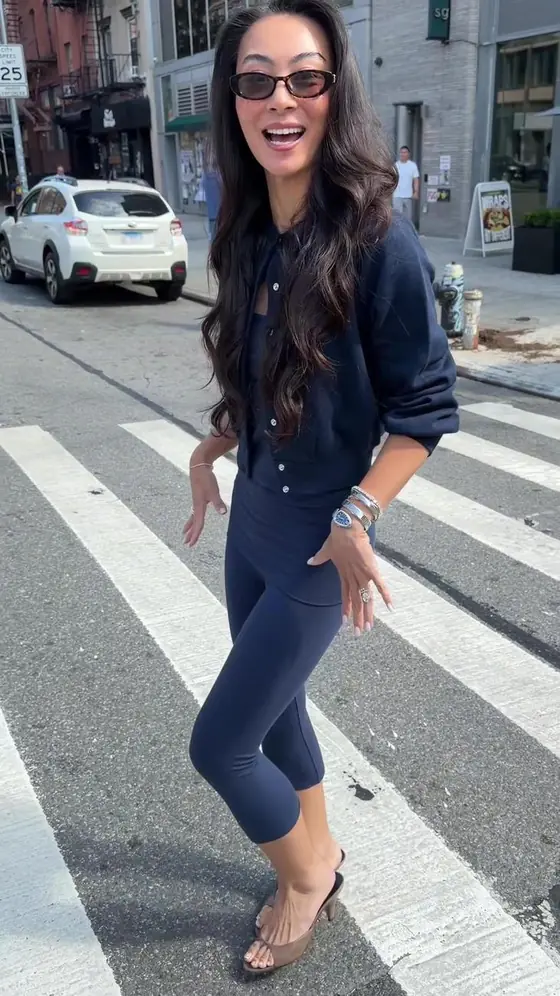 Client ad: a woman crossing a street