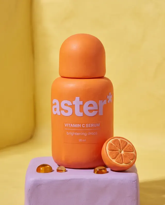 aster* ad: the vitamin C serum on a yellow set