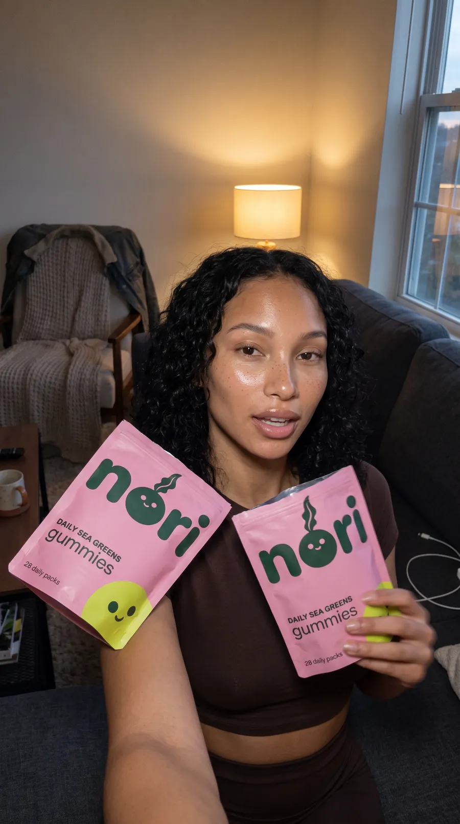 Video still: two friends showing the nori pouch to camera