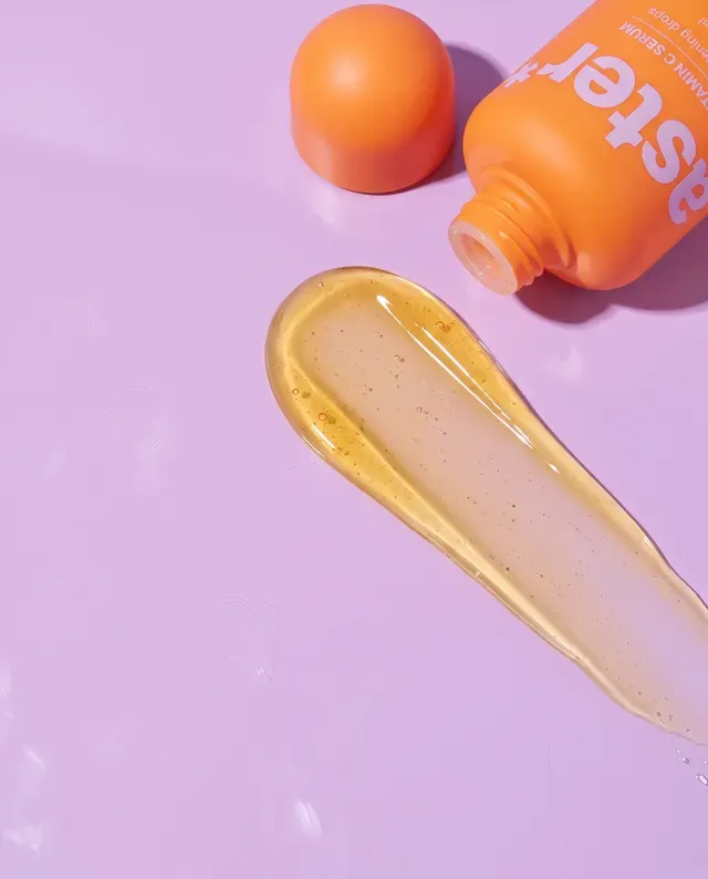 aster* ad, square: a drop of serum on lilac